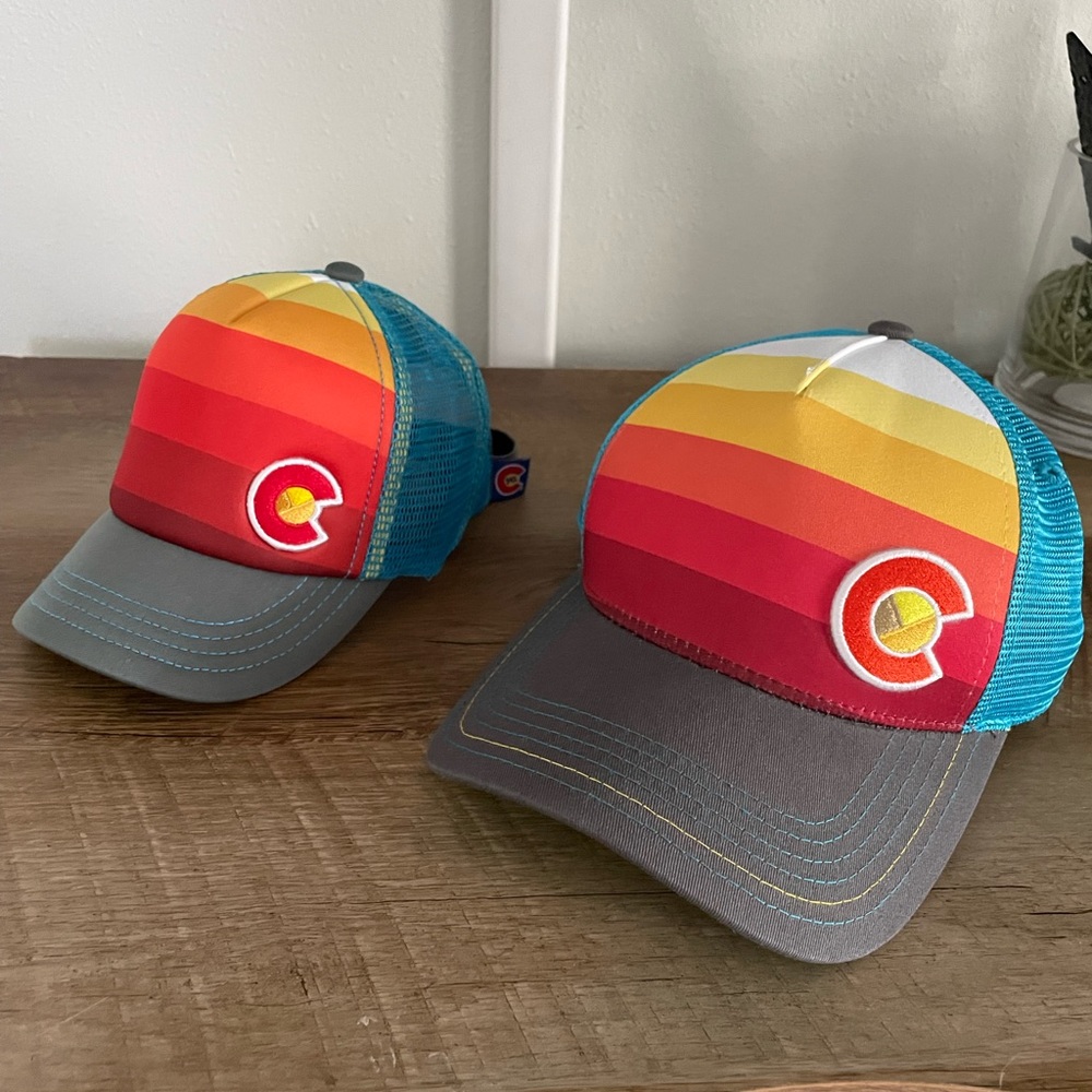 Never worn matching Infant and Adult Small CO hats